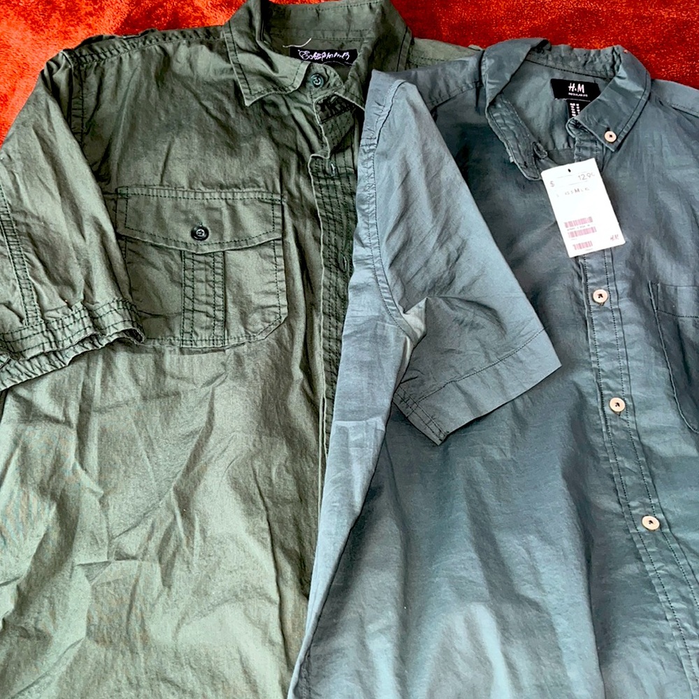 Two Men’s button down green shirts. One with tags. Great condition. Size medium.
